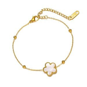 Elegant Gold Bracelet with Mother of Pearl Flower